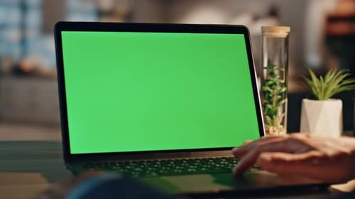 Freelancer Finger Touching Chromakey Laptop Touchpad at Night Office Closeup