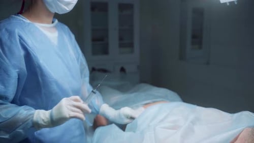 Surgeon Performs Delicate Procedure in Operating Room