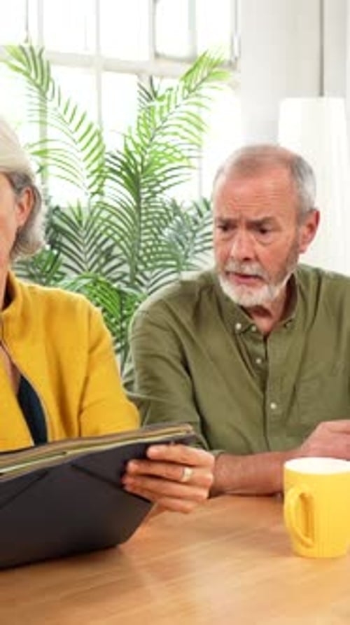 Senior Couple Using Laptop for Finance Planning with Retirement