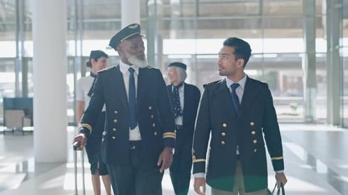 Travel, pilot and walking with people in airport for journey, transportation and teamwork