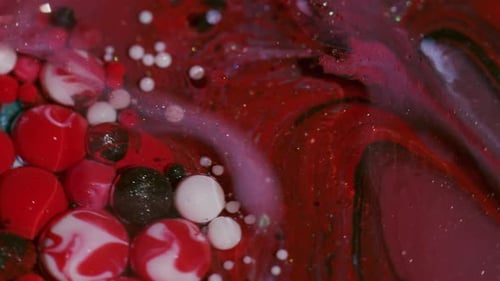 Macro shot of abstract paint and glitter bubbles