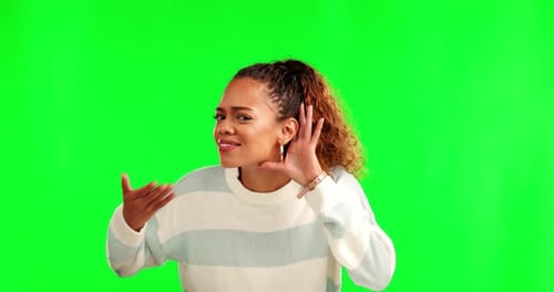 Woman, hear and hand by ear by green screen with face, question and smile for gossip, story or news