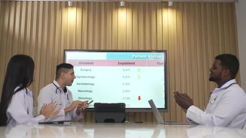 Medical Professionals Discussing Data in Conference Room