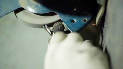 Sharpening Drill Bit on Grinding Wheel