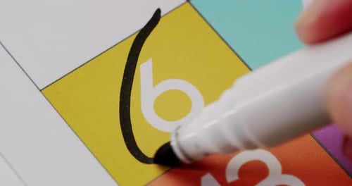 CloseUp Of Calendar Date Highlighted With Black Circle