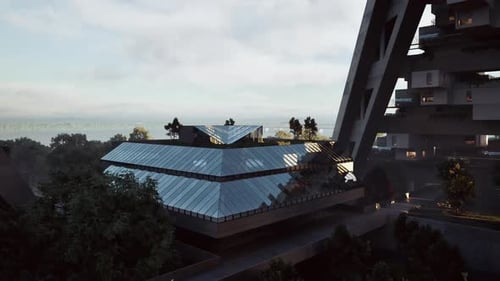 Arquitectura de vidrio rodeada de vegetación al amanecer