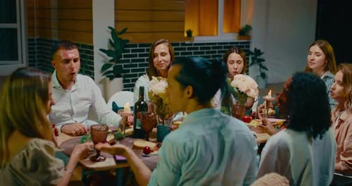 Friends Gather Together at Evening Birthday Party