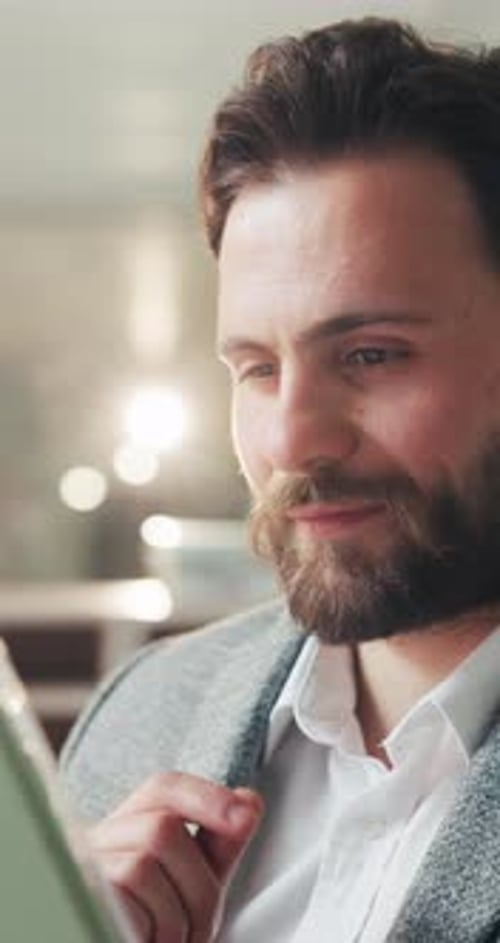 Business, man and reading with tablet in office for research, proofreading and story submission