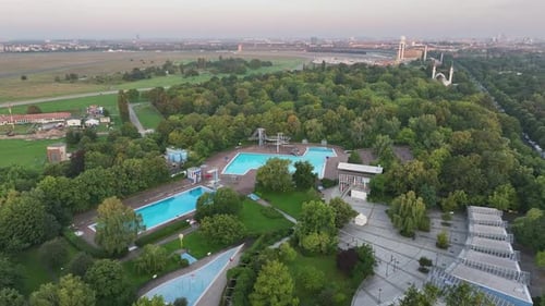 Aerial view of public pools in city park, Germany.