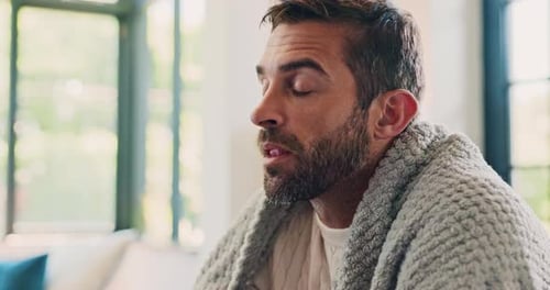 Adult Man in Robe Breathing Slowly Indoors