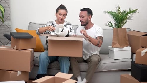 Couple Excitement on Moving Day Unpacks Belongings in Their New Home Estate Adventure