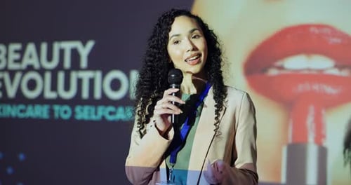 Woman Speaking at Cosmetics and Skincare Conference