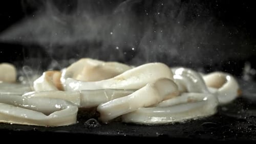 Close up of Squid Rings Cooking in Pan