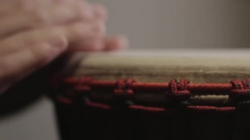 Man Hand Playing The African Djembe Drum - Close Up Shot