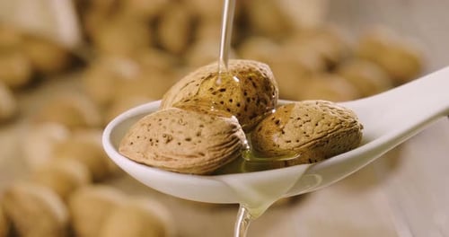 Almond oil composition used for cosmetics, spa, wellness centers. Perfect body oil and moisturizin