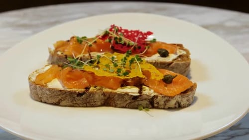 Close Up of Bruschetta with Sliced Salted Salmon Healthy and Wholesome Food Serving Food in a