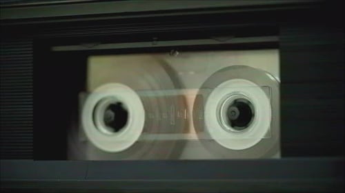 Retro Radio Tape Recorder Audio Cassette Playing Closeup Listening to Music Recording Studio Old