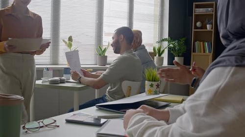 Office Meeting with Diverse Group Working Together