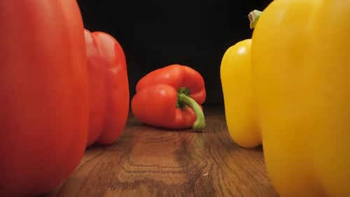 Colorful Bell Peppers on Wooden Table