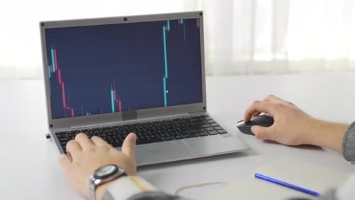 Successful and joyful man winning on the stock market.