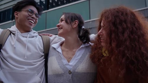 Selfie of Multiracial Group of Young Happy College Students Laughing Four Friends Hugging Smiling