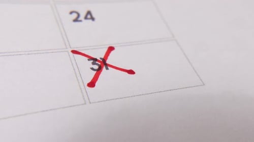 Marking the date number 31, focusing on the number highlighted with a red cross