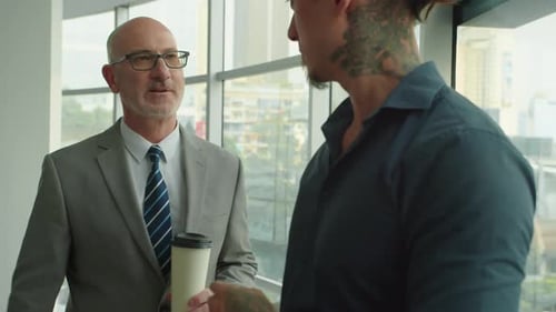 Men Talking in the Workplace