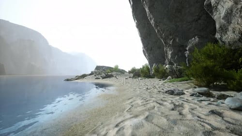 A Scenic Beach with a Breathtaking View of a Cliff and the Ocean