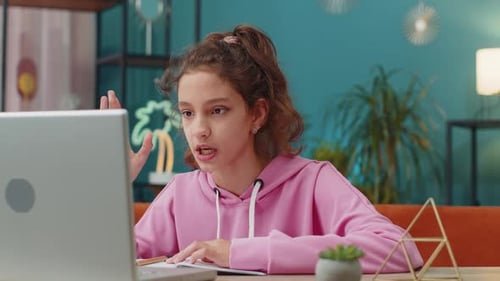 Preteen School Girl Using Laptop for Online Lesson Doing Homework Distance Learning Education