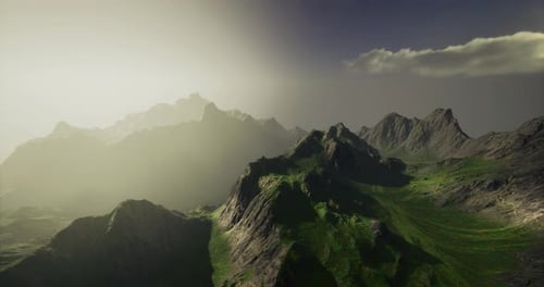 Breathtaking Mountain Landscape Under a Misty Sky at Dusk