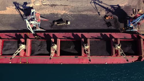 Cargo Ship at the Docks Loading Coal