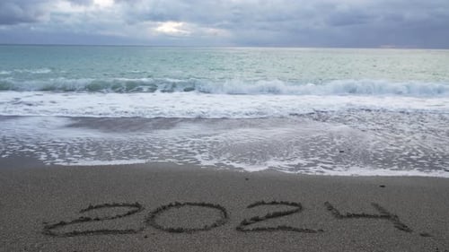 Happy New Year 2025 Hand Written Digit 2024 Washed By Wave on the Sea Beach Abstract Background of