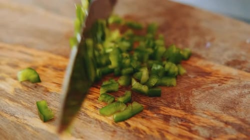 Woman Chop Green Bell Pepper