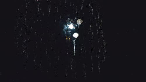 Fireworks Explore over the Lakefront. Ariel footage close ups of a fireworks show.