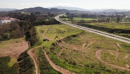 Motorcycle Racers on the Motocross Track