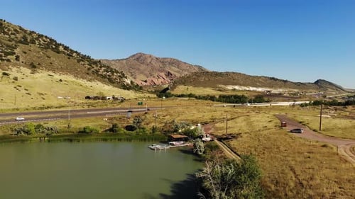 A drone flight over a small lake on a spring day