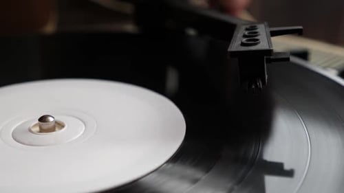 T127. Vinyl player. Needle player close up. Retro vinyl record player.