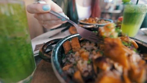 Closeup Of Female eating hummus in a restaurant, Tel-Aviv, Israel
