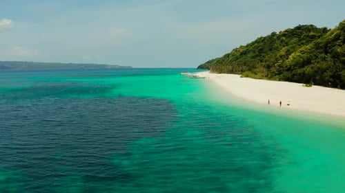 Tropical Beach and Turquoise Lagoon Water