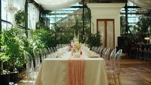 Elegant Wedding Table Setting with Flowers and Candles