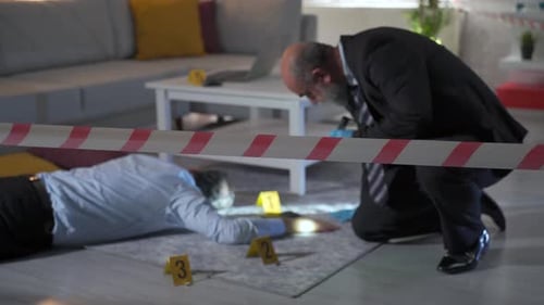 Crime Scene Investigation: Detective Examining Deceased Man