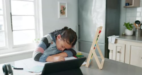 Home school, fatigue and child with tablet, sleep and tired while learning at kitchen counter