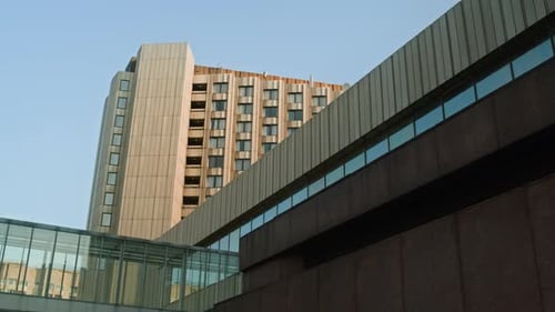 Urban Environment with Concrete Building Facades on Sunny Day