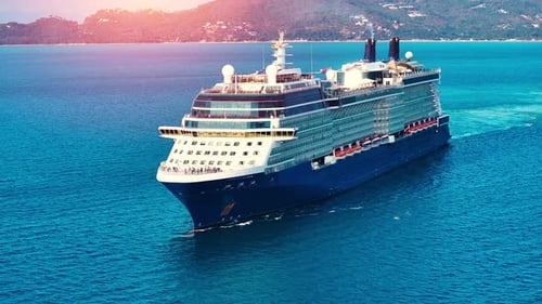 Luxury vacation. Largest cruise ship sailing on the open sea.