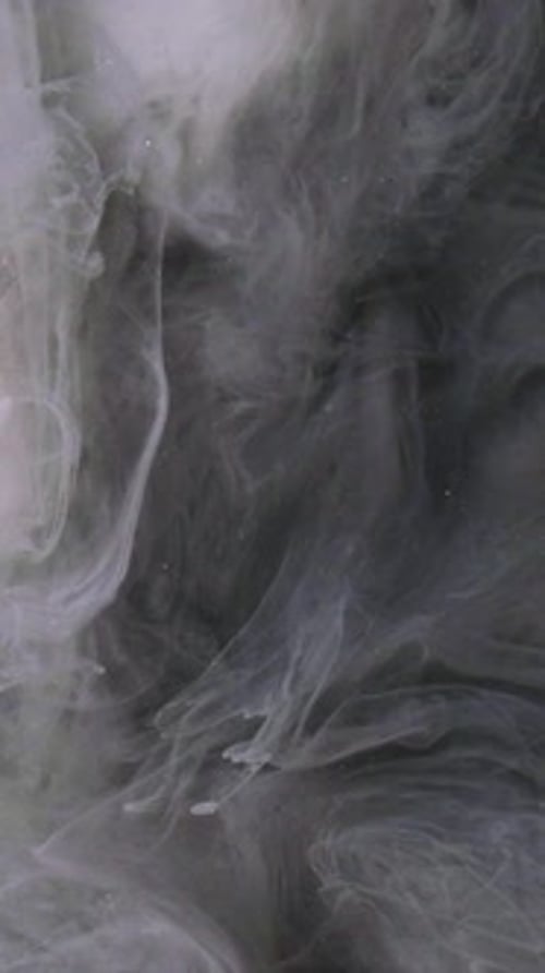 Abstract Swirling Grey and White Liquid Motion