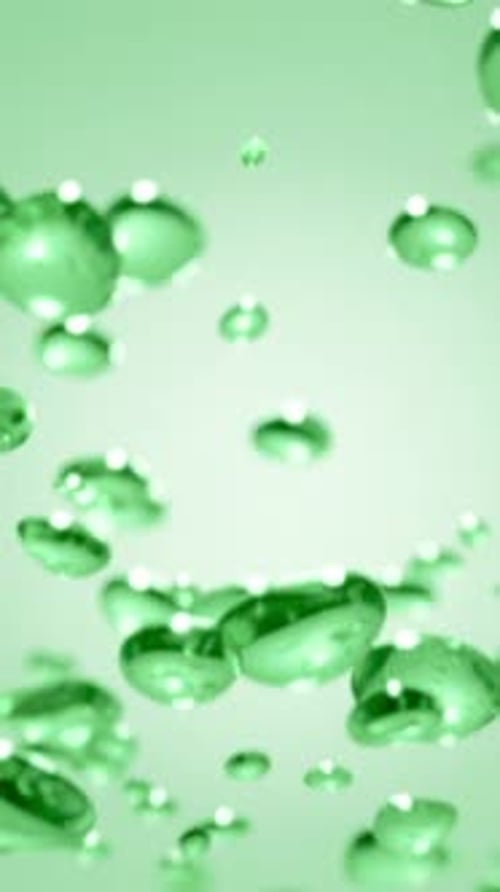 Floating Green Serum Liquid Droplets and Bubbles Aloe Vera or Green Tea Natural Extracts Skincare