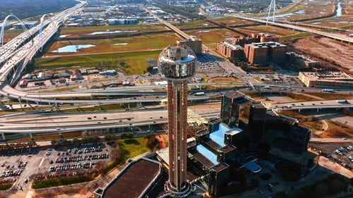Reunion Tower Hotel in Dallas, Texas, USA. Hundreds of cars move by the multiple roads