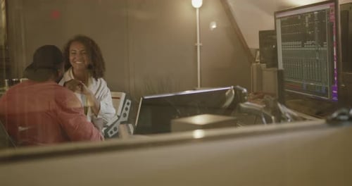 Producer and Singer Composing in Recording Music Studio