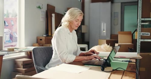 Writing, ecommerce and laptop with woman in warehouse for delivery confirmation