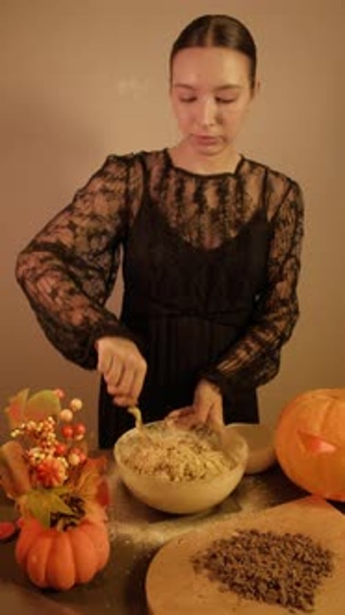 Autumn Atmosphere Large Bowl of Pumpkin Dough on Kitchen Table Chocolate Shavings Halloween